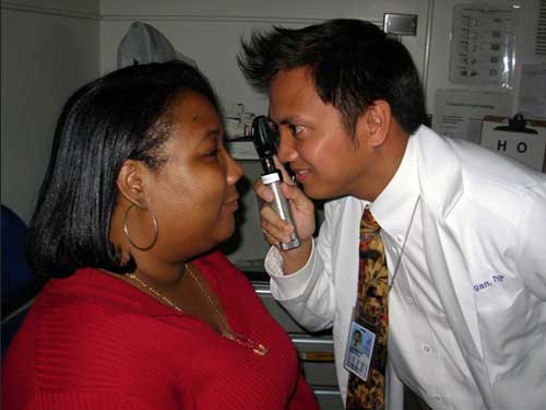 Doctor examining Eye