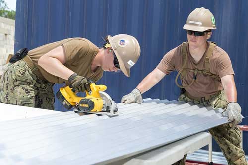 construction worker doing cutting