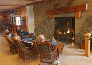 old-sitting-in-front-of-the-Old-Faithful-Snow-Lodge-fireplace