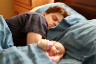 Father and Baby sleeping